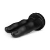 Plug Buttr Victory tenu en main pour illustrer les proportions