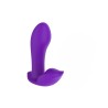vibromasseur violet tenu en main pour montrer son échelle compacte
